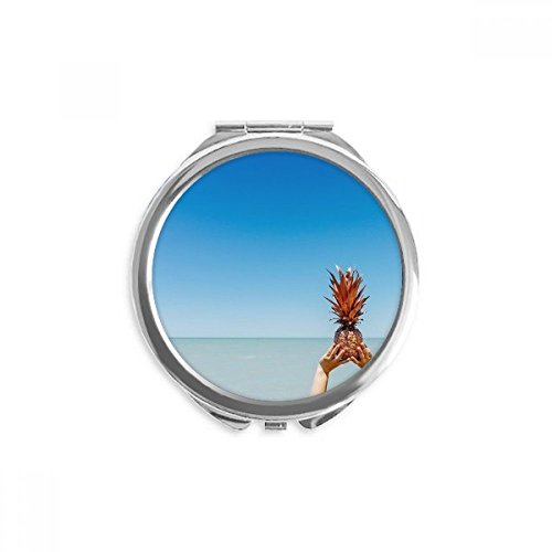 Miroir rond maquillage de poche pour corriger son teint facilement en déplacement