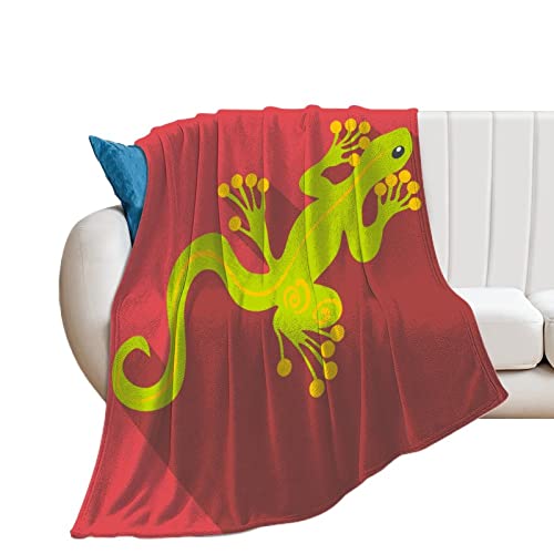 Couverture polaire gecko vert pour réchauffer vos soirées cocooning