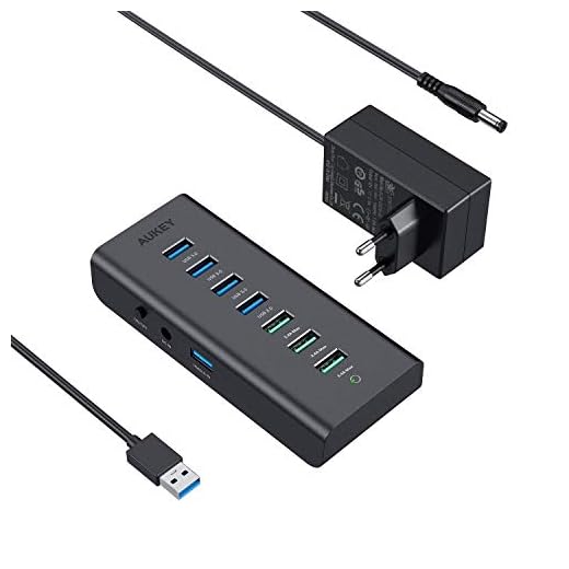 AUKEY Hub USB 3.0 4 Ports SuperSpeed Cable USB de 15 cm Inclus USB Data Hub Compatible avec Windows XP/Vista / 7/8 / 10, Mac OS, Linux etc - Noir (Noir)