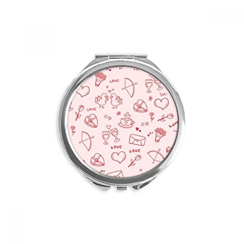 Miroir à la main portable rose pour vos retouches maquillage rapides en déplacement