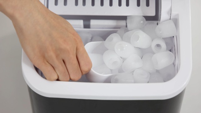 Image of NEWBULIG Ice Makers Countertop with Handle, Portable Ice Machine, 9 Bullet Ice Cubes in 6 Mins, 26lbs in 24Hrs, Auto-Cleaning, with Basket and Scoop, for Home, Kitchen, RV, Camping,Black