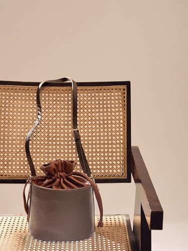 Image of white lily Women's Bucket Bag with Drawstring, Black and Brown Two-Tone, Adjustable Shoulder Strap