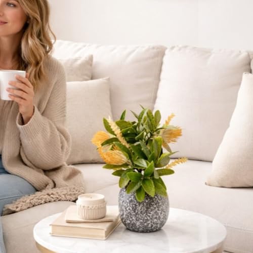 Image of Garden Art Artificial Protea Flower Arrangement Placed in a Small Decorative doted Pot. The Spiky, Cone-Shaped Bloom and Textured Petals are Typical of Protea Flowers (P-0235Peach)