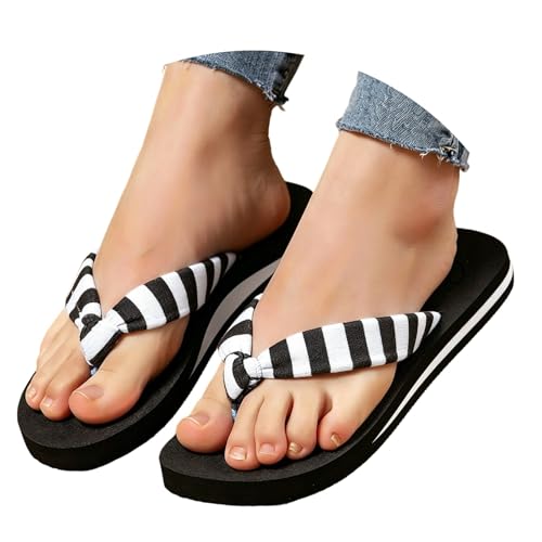 Tong femme compensée contre les pieds fatigués, confort assuré à la plage
