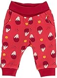El pantalón se compone de tejido Interlock rojo con estampado floral e interior de tejido interlock azul oscuro