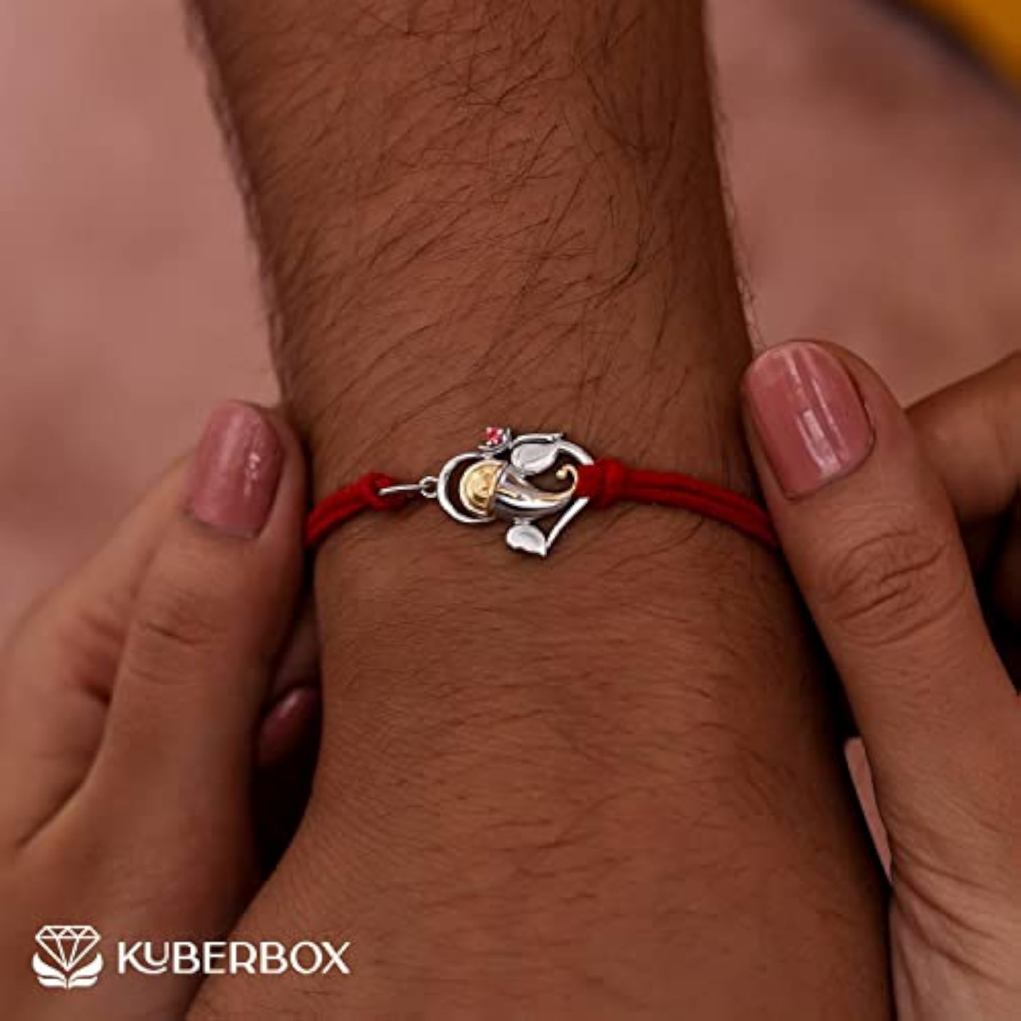 Silver Rakhi with Ganesha Ruby Studded Bracelet for Raksha Bandhan