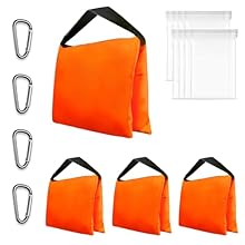 The sand bags for weight feels softer and each sandbag has double zippers and a kind of rubber lining to keep the sand or dust from escaping. Useful with boom arms, light stands, tripod, etc (NOTE: Sandbag is empty, do not contain any material) Tripo...