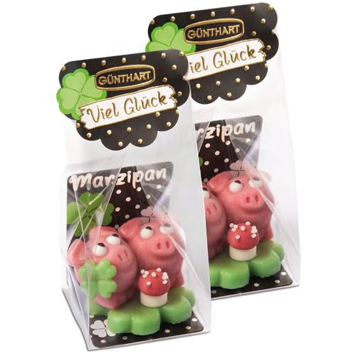 2 Marzipan Schweinchen auf Kleeblatt im Cellophanbeutel – Glücksbringer aus feinem Marzipan – ideal als Neujahrsgeschenk, Tischdeko oder Mitbringsel – Günthart Qualität, handgefertigt, 2er Pack