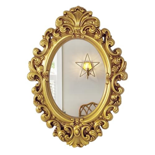 Miroir ovale baroque suspendu doré pour agrandir un salon sombre