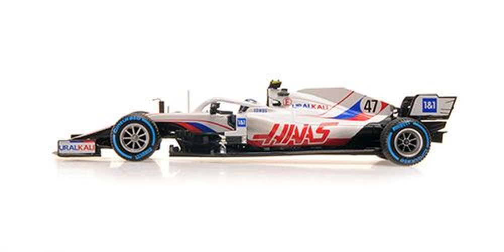 Amazon.com: Minichamps 417211347 1:43 Uralkali Haas F1 Team VF-21