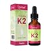 Produktbild Vitamin K2 MK7 (Menachinon) 1.250 Tropfen (200µg pro Portion) in 50ml Flasche. Natives Olivenöl mit Menaquinon aus Fermentation >99% All-Trans. Hohe Bioverfügbarkeit, hochdosiert, vegan & made in DE.