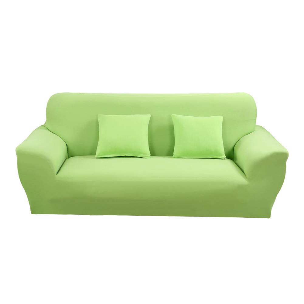 Housse de canapé élastique vert pour retrouver un salon comme neuf