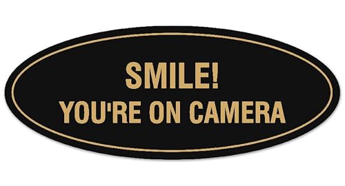 Signs ByLITA Oval Smile You're on Camera Sign | �ǂ݂₷�����^�����O | �H��s�v�̊ȒP���t�� | ���͂ȃt�H�[���e�[�v (�u���b�N/�S�[���h) - S