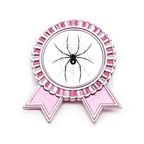 Broche araignée rose en métal : transformez vos tenues basiques avec ce style médaille