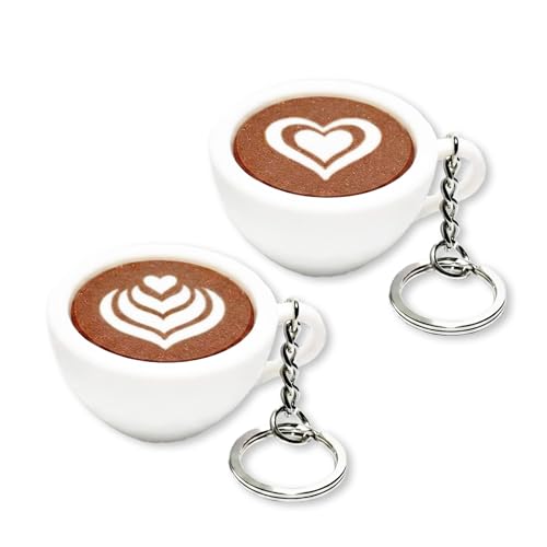 A tiny clicker keychain shaped like a latte art coffee cup — fidget toy meets café aesthetic in a pocket-sized charm.