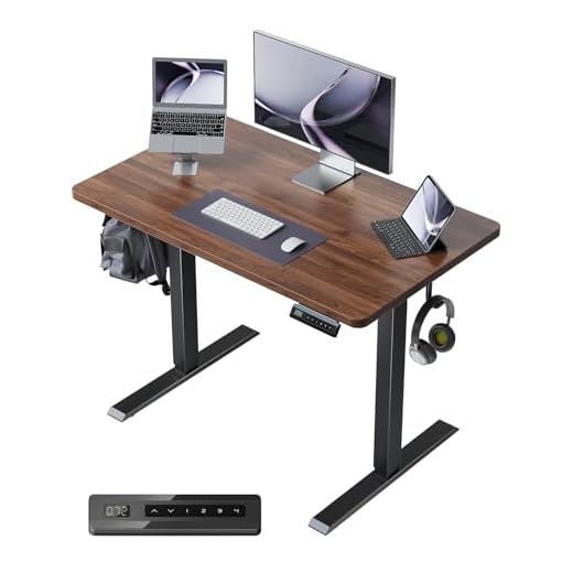 FEZIBO Electric Standing Desk, 40 x 24 Inches Height Adjustable Table, Ergonomic Home Office Furniture with Splice Board, Black Frame/Espresso Top