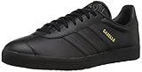 adidas Originals Gazelle, Zapatillas Hombre, Black Gold Metallic, 42 2/3 EU