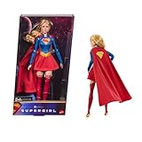 Barbie Signature Muñeca DC Supergirl, Rubia con Traje de superheroína y Capa, muñeca de colección en empaque exhibible con Base para muñeca, JJY04