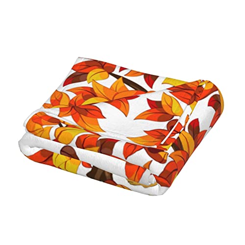 Couverture polaire citrouilles contre le froid en canapé