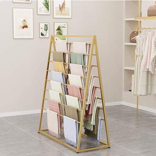 Présentoir de couvertures pour agencer un magasin de vêtements chic