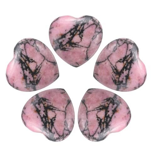 Pierre de quartz violet en cœur pour séance de méditation et rituel de relaxation à la maison