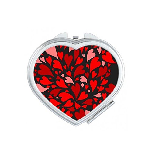 Miroir compact cœur rouge pour retouches maquillage en voyage ou au bureau