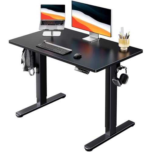 Image of HUANUO Electric Standing Desk, Whole Piece Desktop, Adjustable Height Computer Desk, 4 Height Memory Settings, Sit Stand Up Desk for Home Office, 40 inch x 24 inch, Black