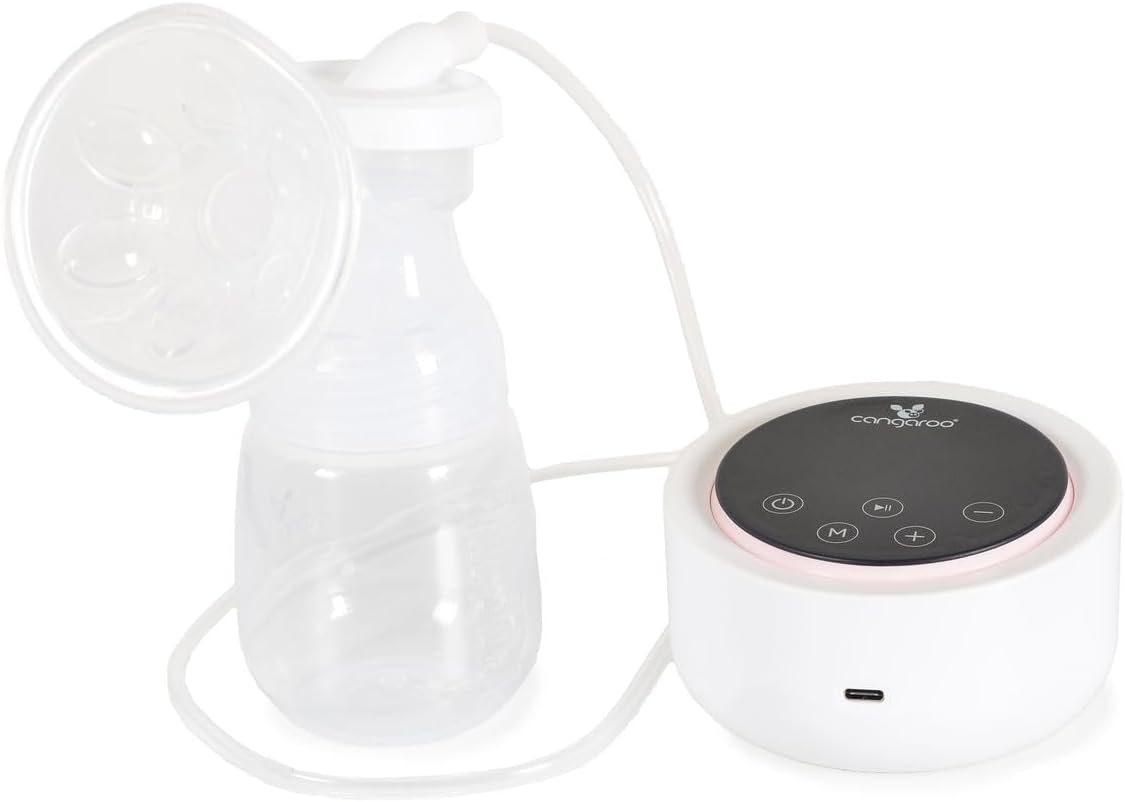 Disassembled breast pump parts laid out for cleaning, including the breast shield, silicone insert, and bottle.