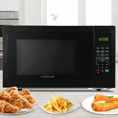 Farberware 1.1 Cu. Ft. Countertop Microwave Oven – 1000 Watts Power, Auto Cook Settings, Defrost, Easy Clean and Child Safety Lock - Black by Farberware - Used condition - Image 6