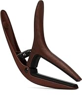 Ernie Ball Axis Capo’s ergonomic features allow for fast and accurate single-handed key changes. Reversible design fits both flat and curved fretboards. Dual Radius guitar capo allows for buzz-free clamping on both electric and acoustic guitars. Robu...