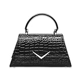 Le secret du sauvetage : doublure en léopard : ne vous laissez pas berner par son extérieur sophistiqué. En ouvrant le rabat magnétique, le sac révèle une doublure intérieure audacieuse avec imprimé léopard. C'est le contraste parfait qui définit l'attitude Liquorbrand : élégante à l'extérieur, sauvage à l'intérieur.