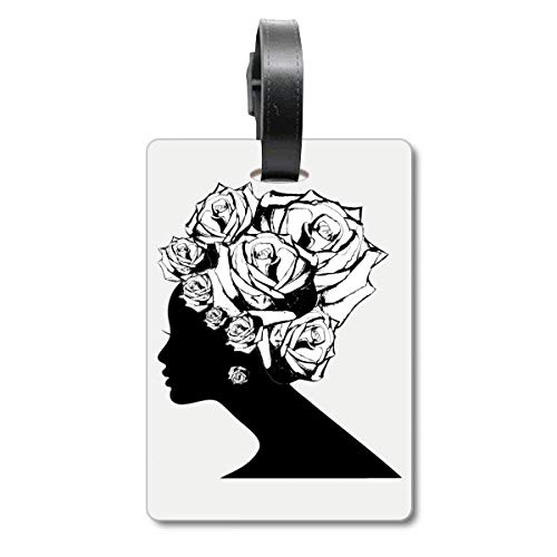 Étiquette de valise rose motif noir et blanc pour identification de bagage