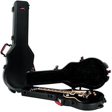 Fits Les Paul & Single Cutaway Electric Guitars ATA molded military grade polyethylene shell TSA approved shutter with impact repellent housing and red trigger. Includes one set (2) keys EPS foam nest with thick black plush lining, extended reach nec...
