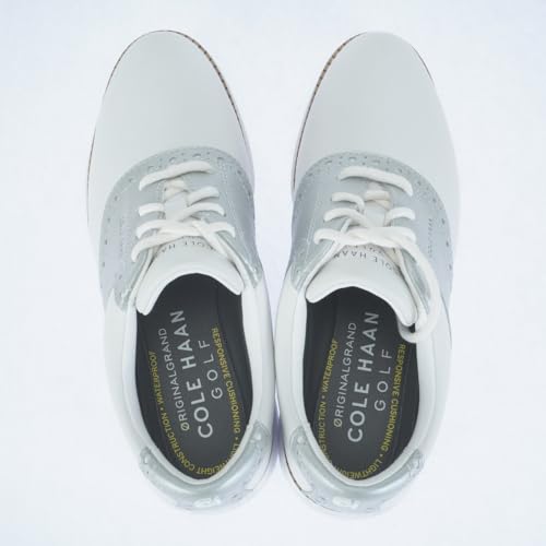 Cole Haan Women's Originalgrand Saddle Golf Sneakers, Optic White/Metallic Silver/Water Proof, 9-B US