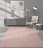 the carpet Renton Moderner Flauschiger Kurzflor Teppich, Anti-Rutsch Gel-Rücken, Florhöhe 25mm, Waschbar bis 30 Grad, Super Soft, Felloptik, Pink, 60 x 110 cm