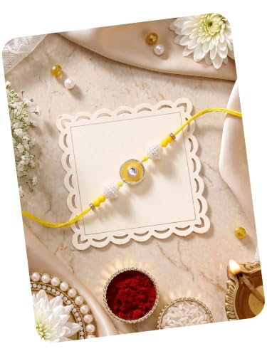 Image of Karatcart Vibrant Yellow Meena Evil Eye Design Handmade Kundan Rakhi for Brother with Roli Chawal