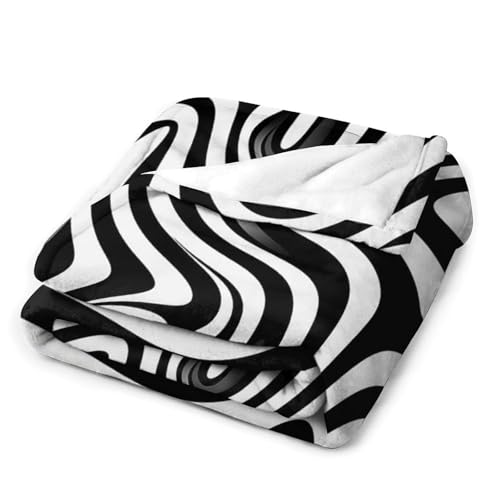 Couverture flanelle Whirlpool Illusion 130x150cm douce pour canapé