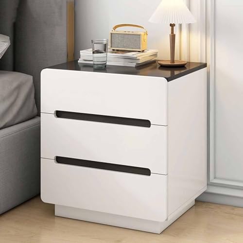 Table de chevet moderne blanche pour optimiser l'espace d'une petite chambre