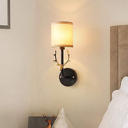 Applique murale tête de cerf dorée design luxe E14 pour salon chic