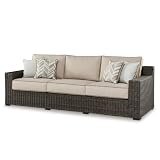 Signature Design by Ashley Coastline Bay Nuvella Weather Resistant Fabric Outdoor Sofa with Cushion and 4 Throw Pillows, Beige & Dark Brown