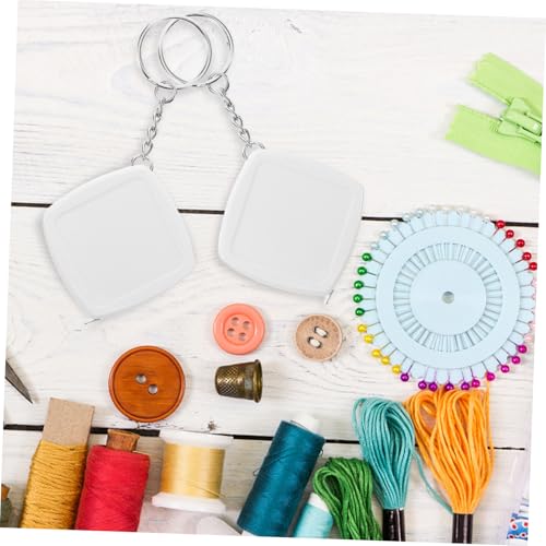 Cinta métrica mini blanca con llavero compacta de acero miniatura 6