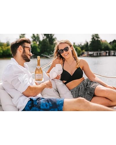 zeigt feine Perle im Glas mit Zitrusaromen für festliche Anlässe. (112 Zeichen) - Detailansicht von Schlumberger Gold...