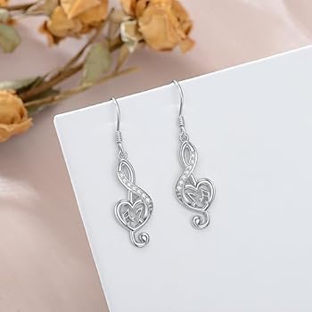 Oorringen van sterling zilver met roségoud detail en zirkonia roségoud detail