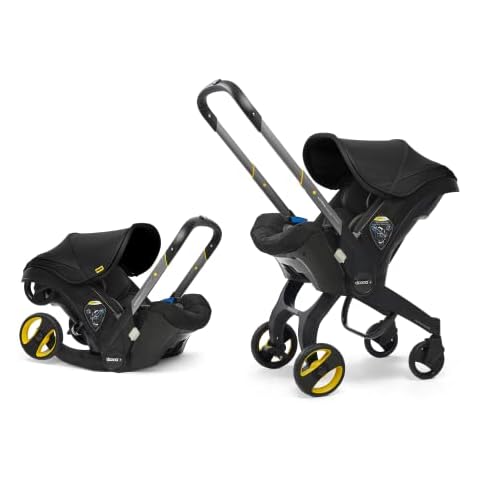 Doona Baby Car Seat & Travel Stroller Nitro Black - Convertible 0+ Car Seat and Pram with 5 Point Safety Harness - Ergonomic Pushchair and Travel System - ISOFIX Base Sold Separately Cover