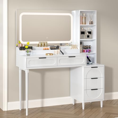 Makeup vanity desk with mirror and lights in a modern bedroom setting
