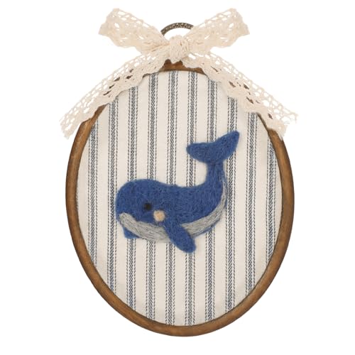 Poster baleine vintage encadré pour créer un cocon marin dans la chambre enfant