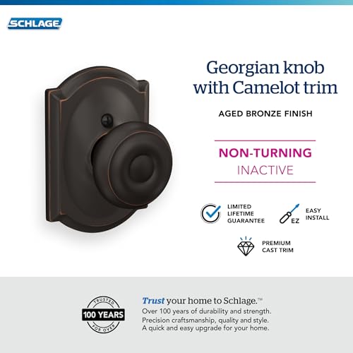 Image of Schlage F170 GEO 716 CAM Georgian Door Knob with Camelot Trim, One Sided Non-Turning Dummy Door Handle, Aged Bronze