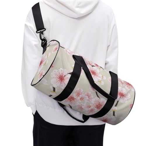 Sac week-end fleur de pêcher rose aux finitions soignées pour voyage chic