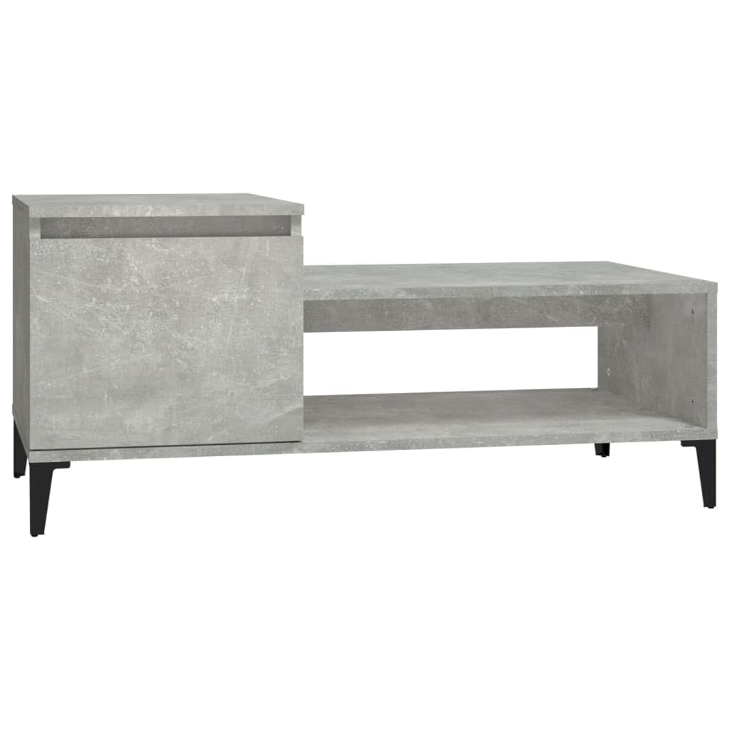 Table basse gris béton pour aménager un coin canapé chaleureux