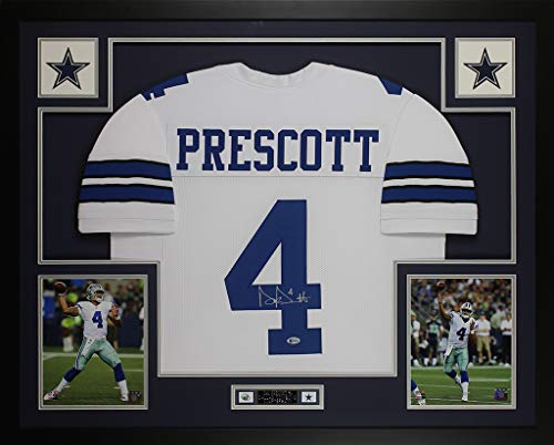 Dak Prescott Autographed White Dallas Jersey - Beautifully Matted and Framed - Hand Signed By Dak Prescott and Certified Authentic by Beckett - Includes Certificate of Authenticity